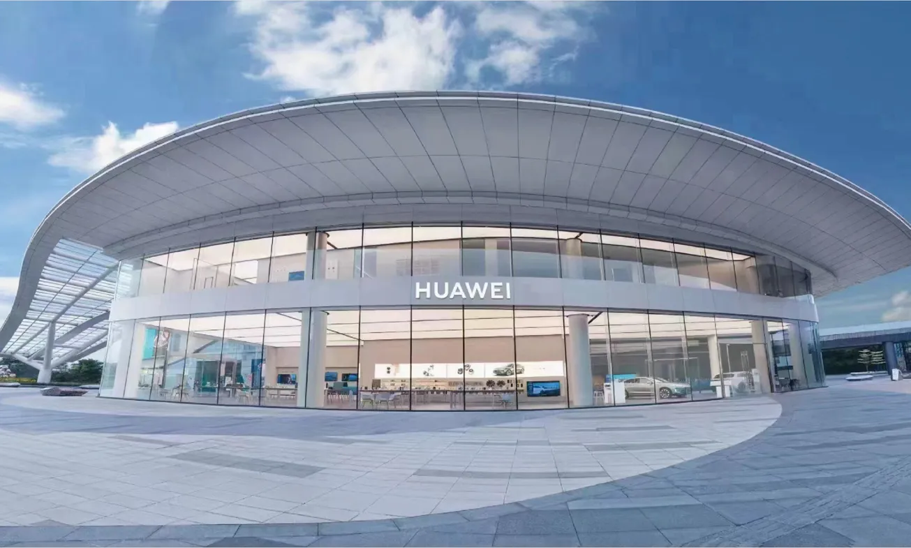 Huawei flagship store exterior with curved roof and glass facade