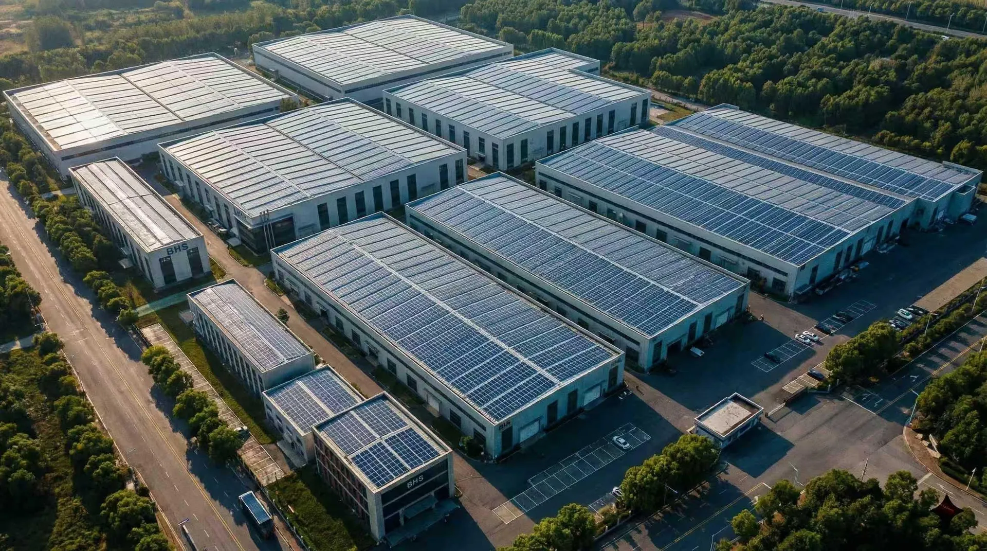 Aerial view of the BHS manufacturing base: production halls with rooftop solar panels